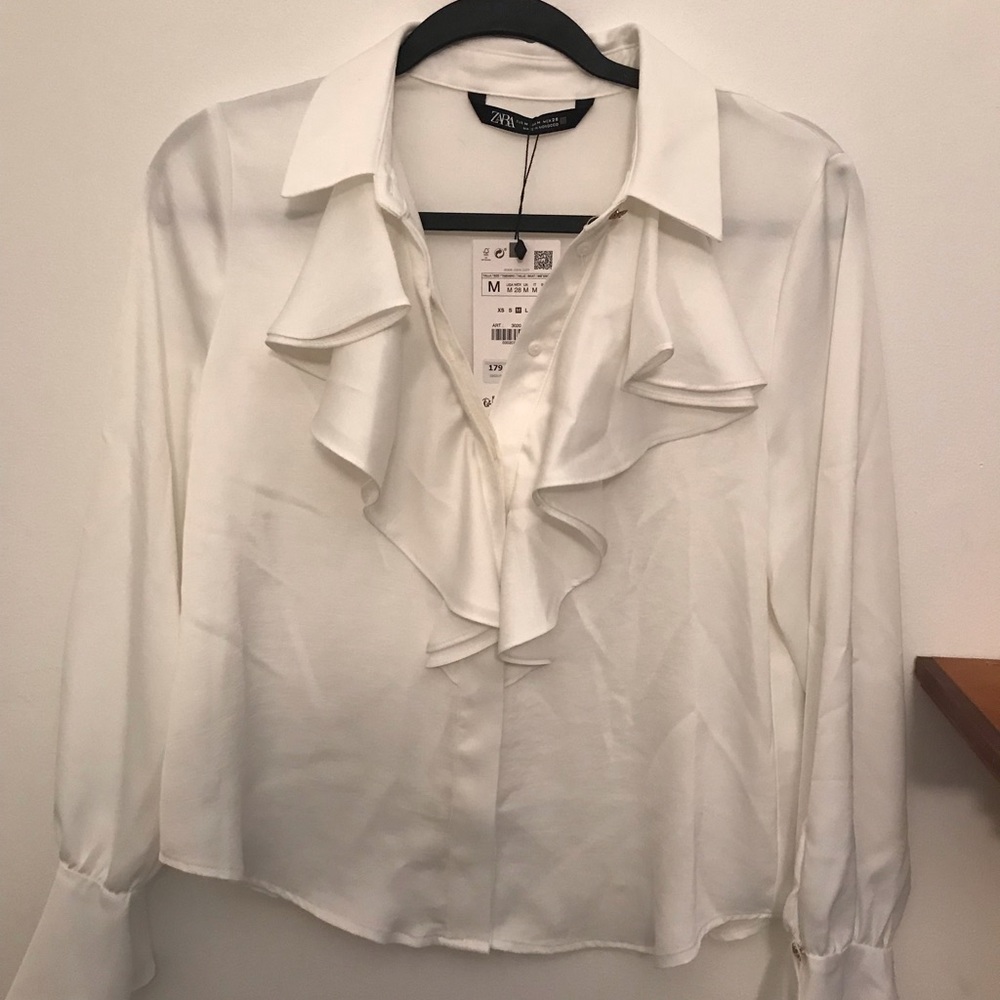 NWT, Zara white silk long sleeves blouse, front is button open, with ruffles